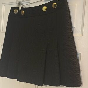 Milly black wool textured miniskirt, pleats in front, size 4